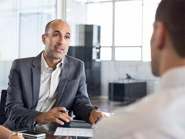 an agent speaking with an individual