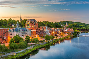 View of building alongside a river in Maine